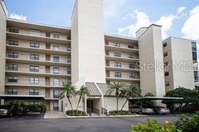 This spacious, light and bright fourth floor condo has a lovely on Cove Cay Country Club in Florida - for sale on GolfHomes.com, golf home, golf lot