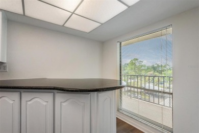 This spacious, light and bright fourth floor condo has a lovely on Cove Cay Country Club in Florida - for sale on GolfHomes.com, golf home, golf lot