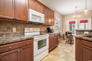 This beautifully maintained 3-bedroom, 2-bath home is located in on Long Bay Club in South Carolina - for sale on GolfHomes.com, golf home, golf lot