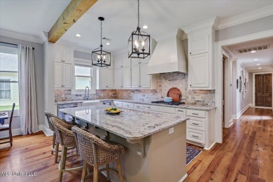Located on a quiet cul-de-sac, this beautifully maintained on Reunion Golf Club in Mississippi - for sale on GolfHomes.com, golf home, golf lot