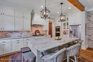 Located on a quiet cul-de-sac, this beautifully maintained on Reunion Golf Club in Mississippi - for sale on GolfHomes.com, golf home, golf lot