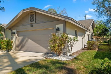 Welcome home to this rarely available 3 bedroom maintenance free on Palm Aire Country Club of Sarasota in Florida - for sale on GolfHomes.com, golf home, golf lot