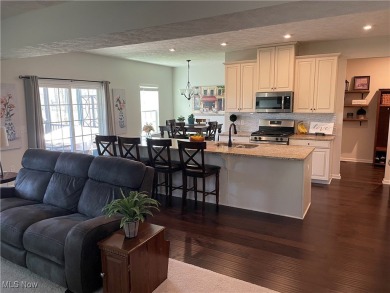 Experience elegance and comfort in this stunning stone-front on Club Walden in Ohio - for sale on GolfHomes.com, golf home, golf lot