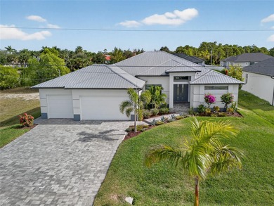 PRIME WATERFRONT IN CAPE CORAL! CONTEMPORARY 3 BEDROOM PLUS DEN on Burnt Store Golf Club in Florida - for sale on GolfHomes.com, golf home, golf lot