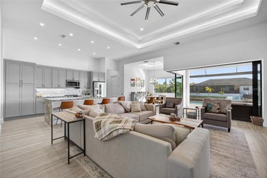 PRIME WATERFRONT IN CAPE CORAL! CONTEMPORARY 3 BEDROOM PLUS DEN on Burnt Store Golf Club in Florida - for sale on GolfHomes.com, golf home, golf lot