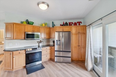 Beautifully updated Watermark Condo! Located off the 18th Hole on Watermark Country Club in Michigan - for sale on GolfHomes.com, golf home, golf lot