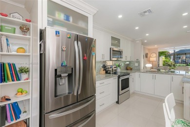 STUNNING COMPLETELY REMODELED TOWNHOUSE IN DESIRABLE AREA OF on Costa Greens Golf Club in Florida - for sale on GolfHomes.com, golf home, golf lot