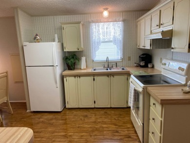 Enjoy the Florida lifestyle in this Fully Furnished - Turn Key on Spanish Lakes Fairways in Florida - for sale on GolfHomes.com, golf home, golf lot