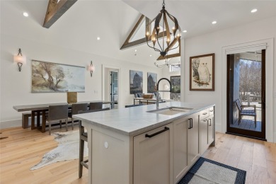 Welcome to this stunning, completely remodeled home that sets on Wildcat Cliffs Country Club in North Carolina - for sale on GolfHomes.com, golf home, golf lot