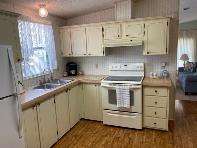 Enjoy the Florida lifestyle in this Fully Furnished - Turn Key on Spanish Lakes Fairways in Florida - for sale on GolfHomes.com, golf home, golf lot