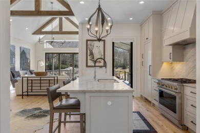 Welcome to this stunning, completely remodeled home that sets on Wildcat Cliffs Country Club in North Carolina - for sale on GolfHomes.com, golf home, golf lot