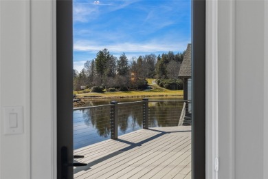 Welcome to this stunning, completely remodeled home that sets on Wildcat Cliffs Country Club in North Carolina - for sale on GolfHomes.com, golf home, golf lot