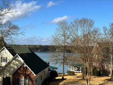 This modern lakeview home in Stoney Point, Greenwood, SC on The Links At Stoney Point in South Carolina - for sale on GolfHomes.com, golf home, golf lot