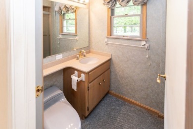 Sprawling 3 bed 3 bath brick ranch with golf course views! on Uniontown Country Club in Pennsylvania - for sale on GolfHomes.com, golf home, golf lot