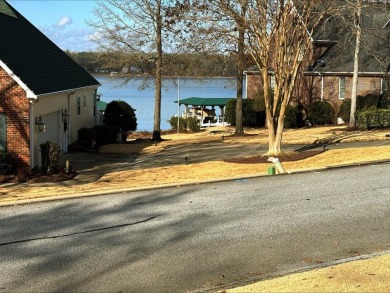 This modern lakeview home in Stoney Point, Greenwood, SC on The Links At Stoney Point in South Carolina - for sale on GolfHomes.com, golf home, golf lot