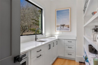 Welcome to this stunning, completely remodeled home that sets on Wildcat Cliffs Country Club in North Carolina - for sale on GolfHomes.com, golf home, golf lot