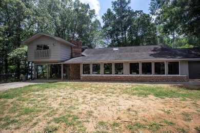 This modern lakeview home in Stoney Point, Greenwood, SC on The Links At Stoney Point in South Carolina - for sale on GolfHomes.com, golf home, golf lot