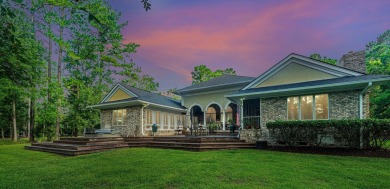 Nestled in the exclusive, gated golf course community of Dunes on Dunes West Golf Club in South Carolina - for sale on GolfHomes.com, golf home, golf lot