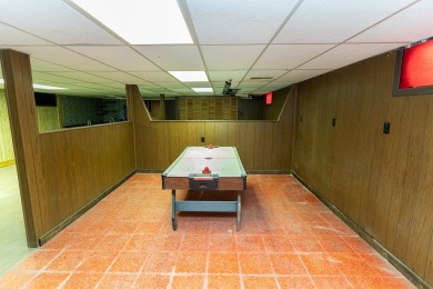 Sprawling 3 bed 3 bath brick ranch with golf course views! on Uniontown Country Club in Pennsylvania - for sale on GolfHomes.com, golf home, golf lot