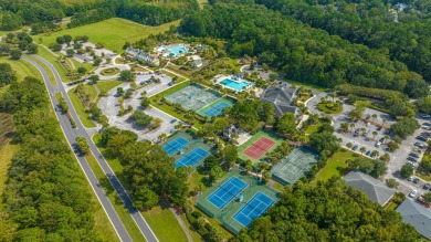 Nestled in the exclusive, gated golf course community of Dunes on Dunes West Golf Club in South Carolina - for sale on GolfHomes.com, golf home, golf lot