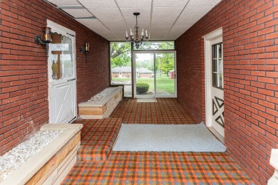 Sprawling 3 bed 3 bath brick ranch with golf course views! on Uniontown Country Club in Pennsylvania - for sale on GolfHomes.com, golf home, golf lot