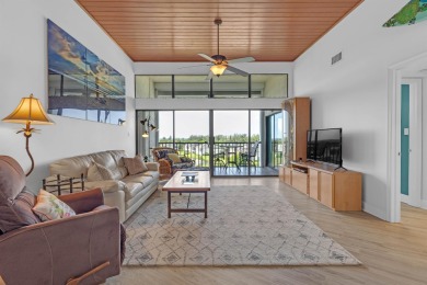 Top floor, high ceilings and expansive views of the river from on Ocean Village Golf Course in Florida - for sale on GolfHomes.com, golf home, golf lot