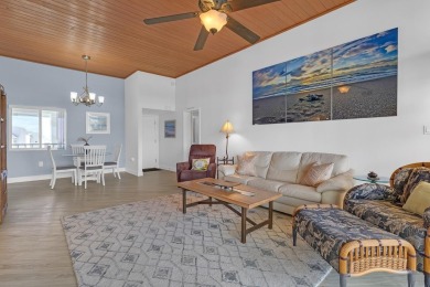 Top floor, high ceilings and expansive views of the river from on Ocean Village Golf Course in Florida - for sale on GolfHomes.com, golf home, golf lot