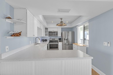 Top floor, high ceilings and expansive views of the river from on Ocean Village Golf Course in Florida - for sale on GolfHomes.com, golf home, golf lot