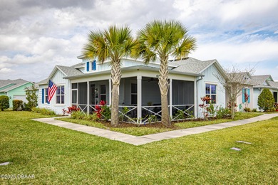 Perfectly located Dreamsicle cottage 2 bedroom/ 2 bath with den on LPGA International Golf Course in Florida - for sale on GolfHomes.com, golf home, golf lot