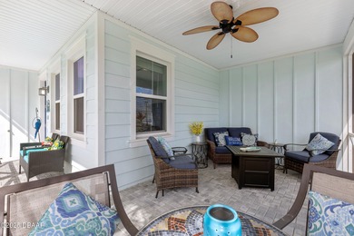 Perfectly located Dreamsicle cottage 2 bedroom/ 2 bath with den on LPGA International Golf Course in Florida - for sale on GolfHomes.com, golf home, golf lot