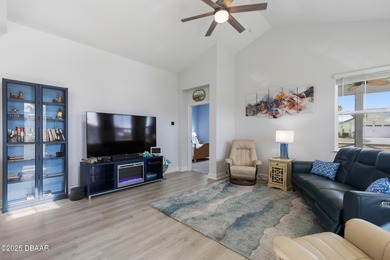 Perfectly located Dreamsicle cottage 2 bedroom/ 2 bath with den on LPGA International Golf Course in Florida - for sale on GolfHomes.com, golf home, golf lot