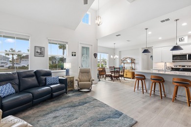 Perfectly located Dreamsicle cottage 2 bedroom/ 2 bath with den on LPGA International Golf Course in Florida - for sale on GolfHomes.com, golf home, golf lot