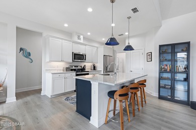 Perfectly located Dreamsicle cottage 2 bedroom/ 2 bath with den on LPGA International Golf Course in Florida - for sale on GolfHomes.com, golf home, golf lot