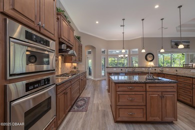 Halifax Plantation pool home. Immaculately maintained. Built by on Halifax Plantation Golf Club in Florida - for sale on GolfHomes.com, golf home, golf lot