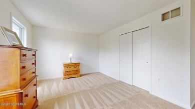 Welcome to this stunning 4-bedroom, 2.5-bath Colonial nestled in on Ocean Acres Country Club in New Jersey - for sale on GolfHomes.com, golf home, golf lot