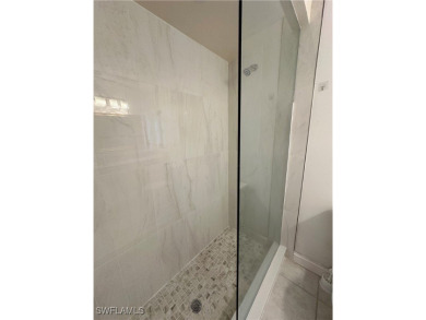 TRANQUIL LIVING at its FINEST! This RENOVATED home feels like on The Forest Country Club in Florida - for sale on GolfHomes.com, golf home, golf lot
