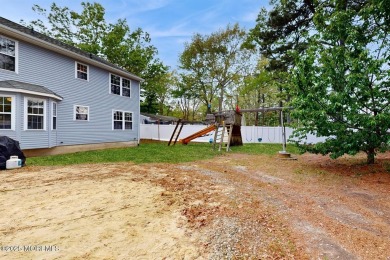 Welcome to this stunning 4-bedroom, 2.5-bath Colonial nestled in on Ocean Acres Country Club in New Jersey - for sale on GolfHomes.com, golf home, golf lot