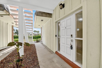 This updated first-floor condo combines comfort, security, and on Atlantis Golf Club in Florida - for sale on GolfHomes.com, golf home, golf lot