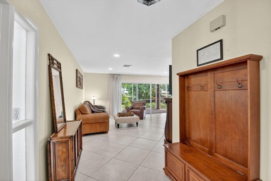 This updated first-floor condo combines comfort, security, and on Atlantis Golf Club in Florida - for sale on GolfHomes.com, golf home, golf lot
