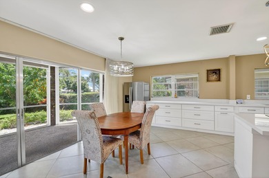 This updated first-floor condo combines comfort, security, and on Atlantis Golf Club in Florida - for sale on GolfHomes.com, golf home, golf lot