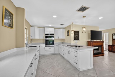 This updated first-floor condo combines comfort, security, and on Atlantis Golf Club in Florida - for sale on GolfHomes.com, golf home, golf lot