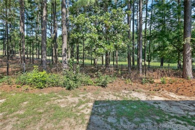 Nestled between mature pines in the exclusive Anderson Creek on Anderson Creek Golf Club in North Carolina - for sale on GolfHomes.com, golf home, golf lot