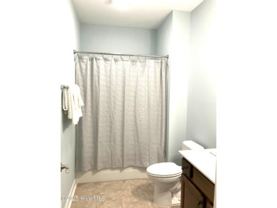 Charming Coastal Cottage in Winding River Plantation - Priced to on Carolina National Golf Club in North Carolina - for sale on GolfHomes.com, golf home, golf lot