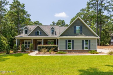 Welcome to this beautiful custom-built 4-bedroom, 3.5-bath home on Whispering Woods in North Carolina - for sale on GolfHomes.com, golf home, golf lot