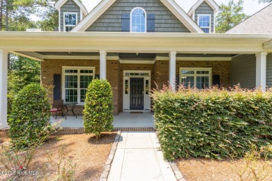 Welcome to this beautiful custom-built 4-bedroom, 3.5-bath home on Whispering Woods in North Carolina - for sale on GolfHomes.com, golf home, golf lot