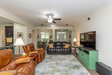 Welcome to this beautiful custom-built 4-bedroom, 3.5-bath home on Whispering Woods in North Carolina - for sale on GolfHomes.com, golf home, golf lot