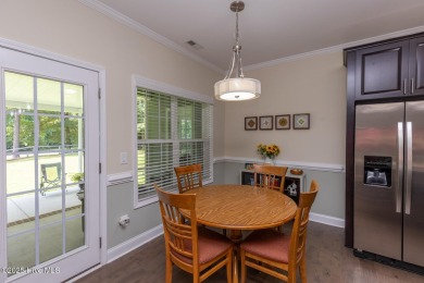 Welcome to this beautiful custom-built 4-bedroom, 3.5-bath home on Whispering Woods in North Carolina - for sale on GolfHomes.com, golf home, golf lot