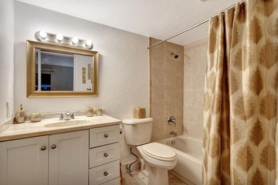 Bright first floor condo in Wynmoor, a gated 55 plus community on Wynmoor Golf Course in Florida - for sale on GolfHomes.com, golf home, golf lot