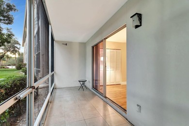 Bright first floor condo in Wynmoor, a gated 55 plus community on Wynmoor Golf Course in Florida - for sale on GolfHomes.com, golf home, golf lot