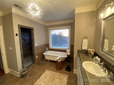 Experience luxury living in The Point at Trump National Golf on Trump National Golf Club Charlotte in North Carolina - for sale on GolfHomes.com, golf home, golf lot